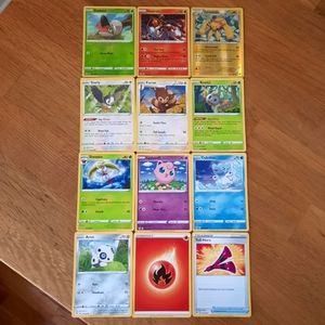 x12 Pokemon Card bundle - includes holographic cards
